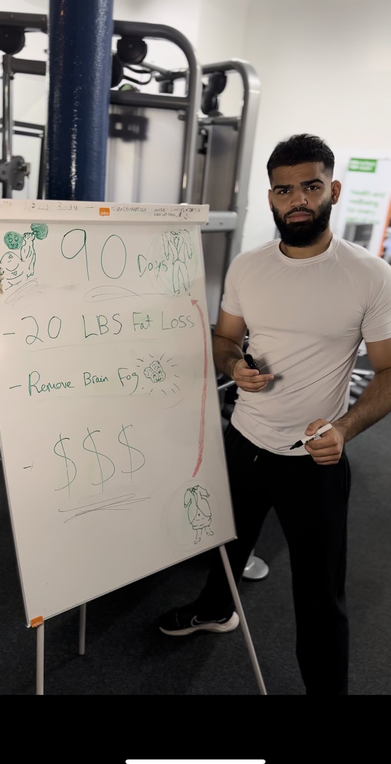 Hasnain mapping a 90-day plan on a whiteboard